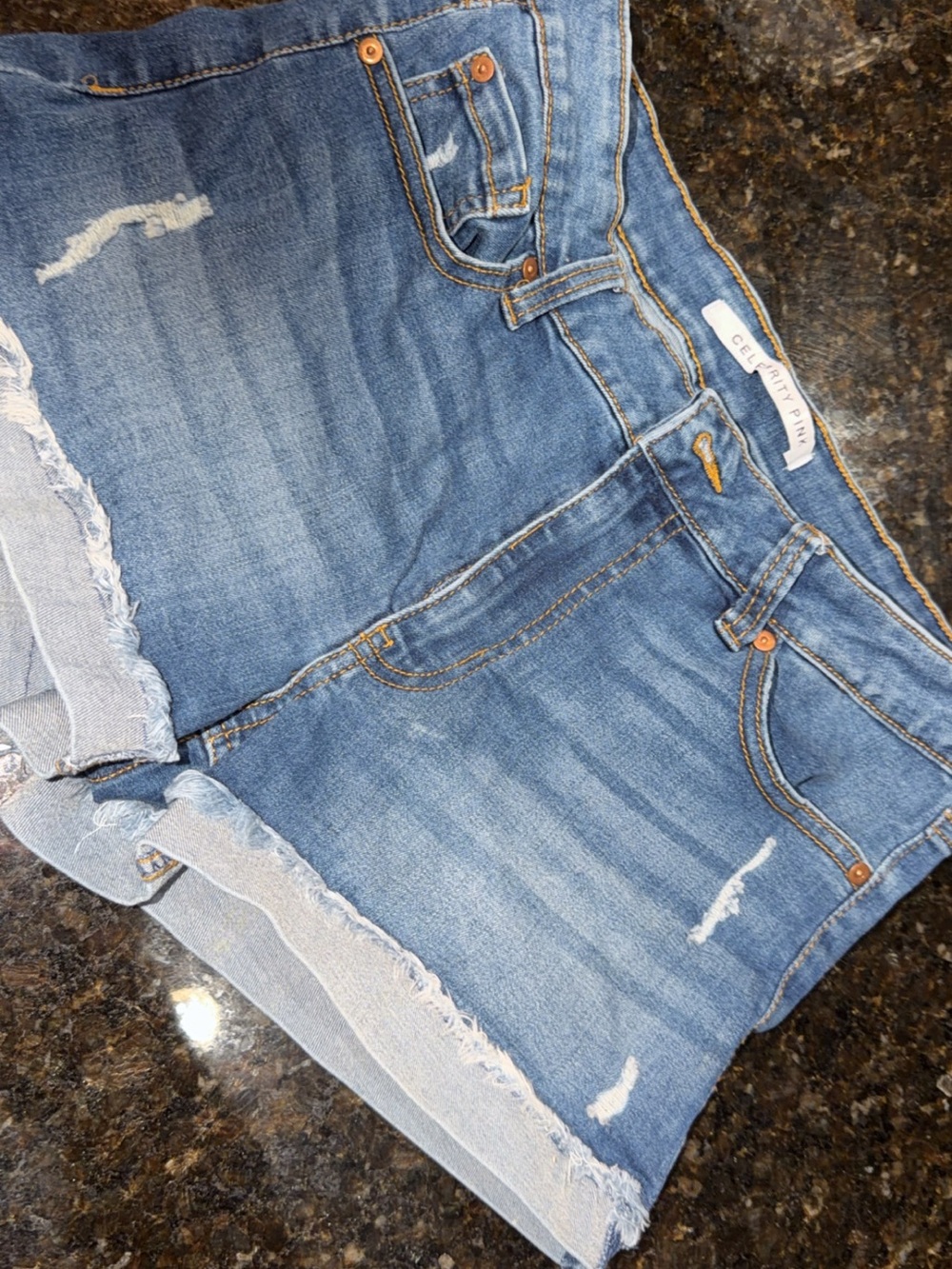 Celebrity Pink Light Blue Distressed Denim Shorts